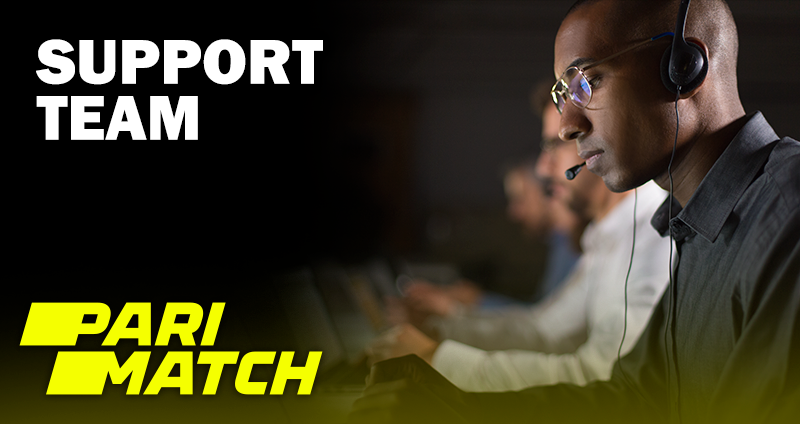 A man with headphones in front of his laptop and the parimatch logo